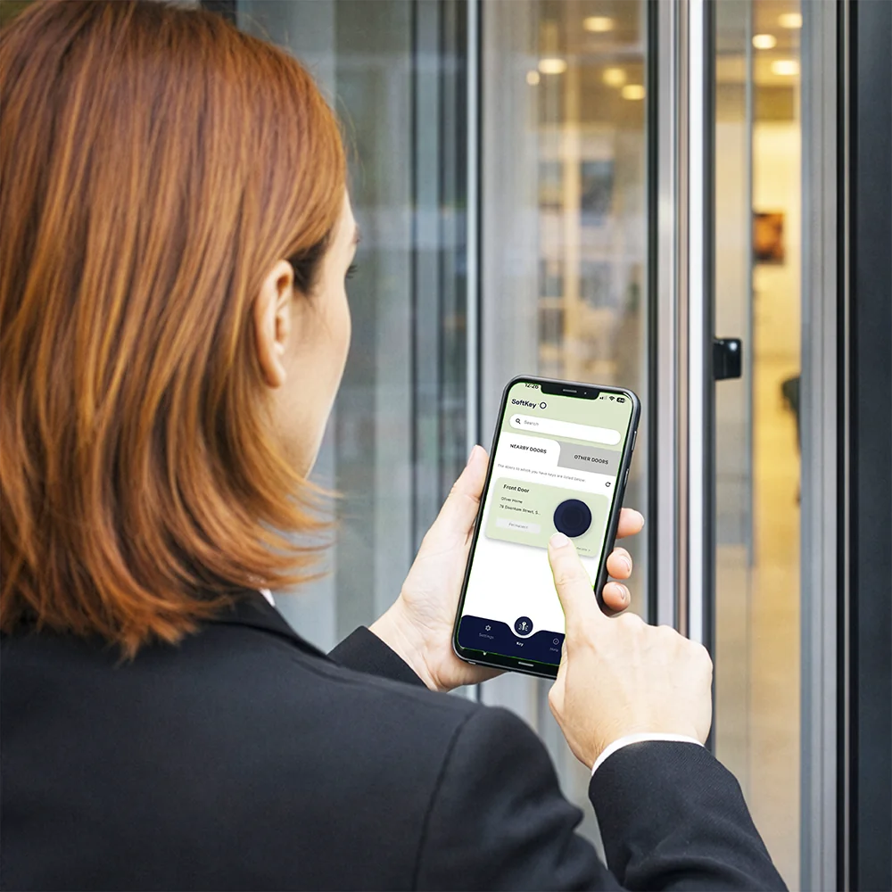 Person using SoftKey smartphone access at a door